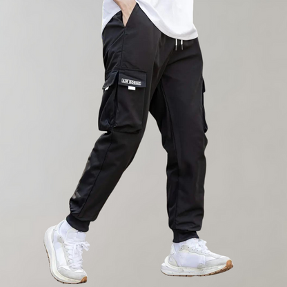 Ankor - Men's trousers with drawstring and flap pockets