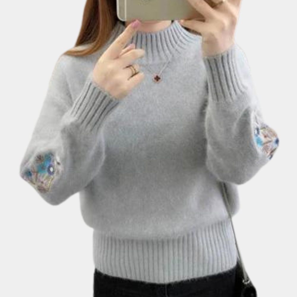 Thick women's sweater with floral embroidery